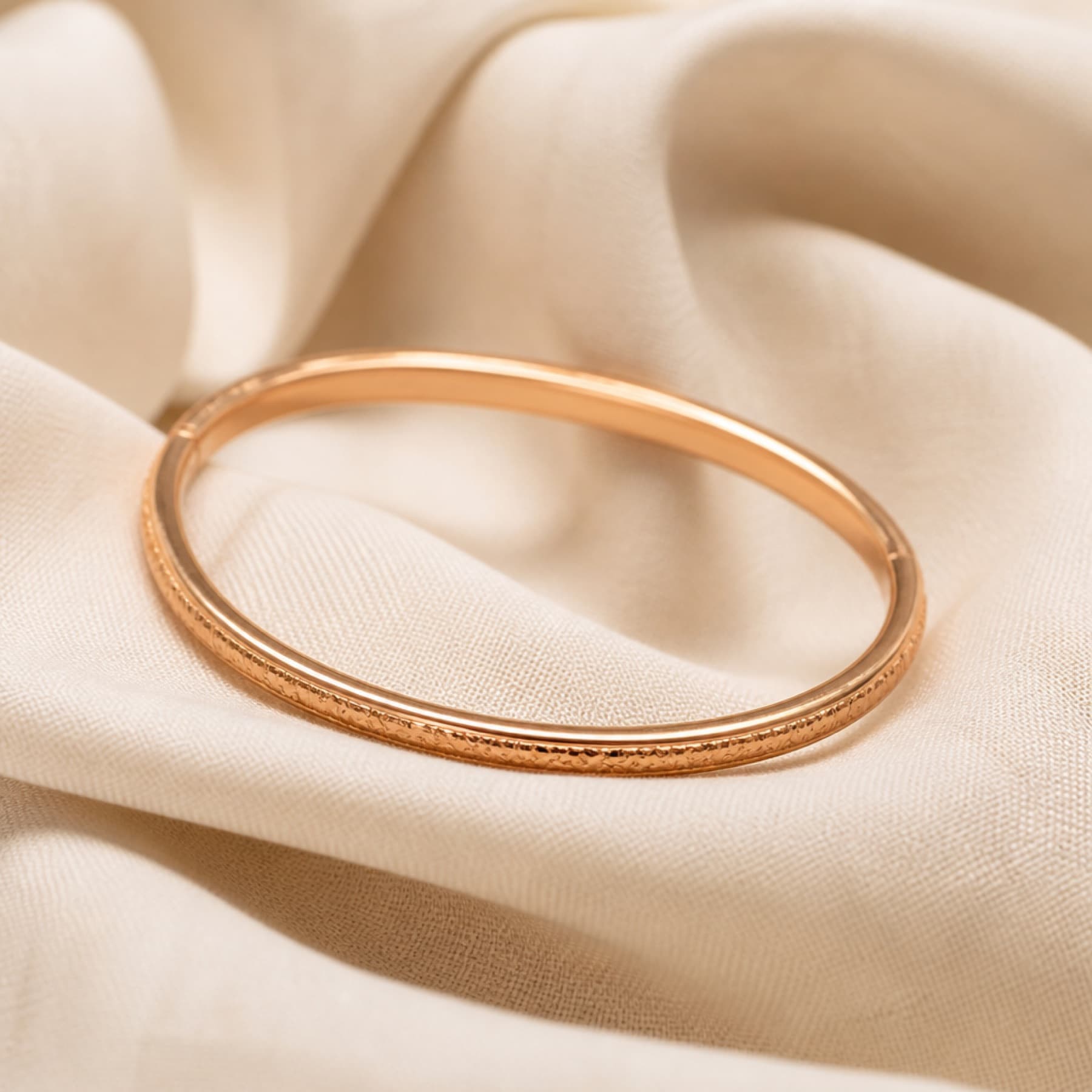 Carved Bangle rose-tone bangles